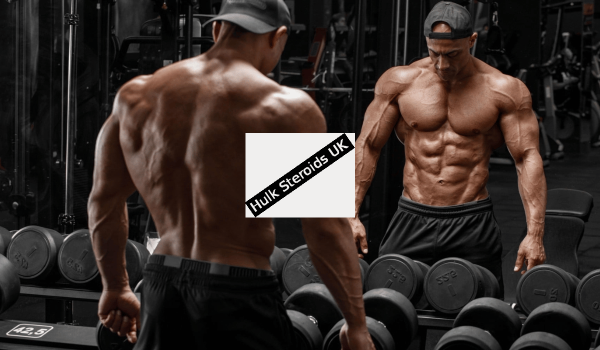 Physique athlete analyzing performance recovery and sustainable training progression