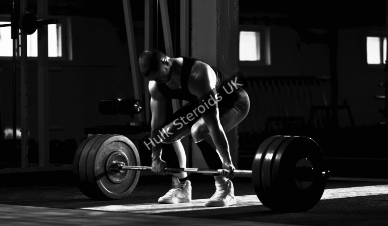 Advanced bodybuilder focusing on recovery precision and long-term muscle development