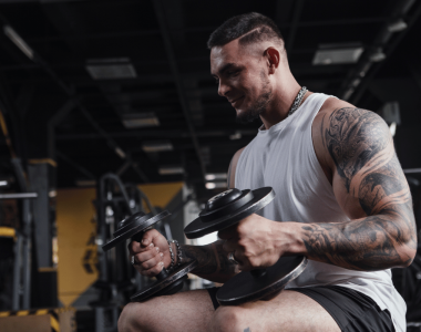 Bodybuilder focusing on recovery efficiency during an intensive muscle growth phase